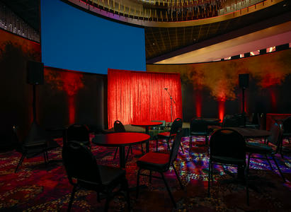 A group of people clinking wine glasses.